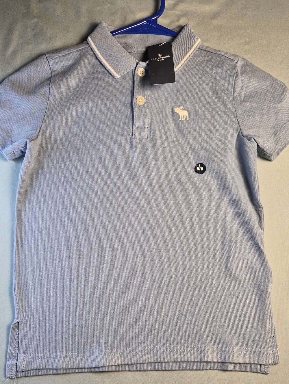 abercrombie kids Light Blue Polo Shirt with White Logo